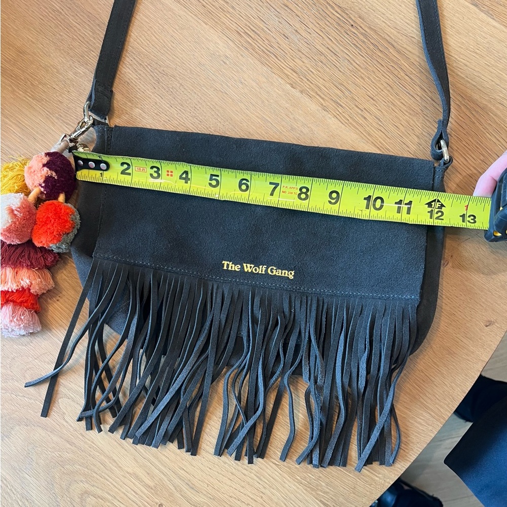 The Wolf Gang Charcoal Crossbody Bag with Fringe and Pom-Poms - Picture 3 of 6